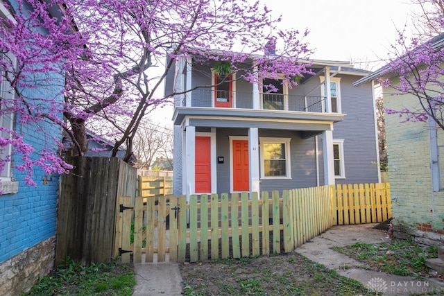 view of front of house with a balcony