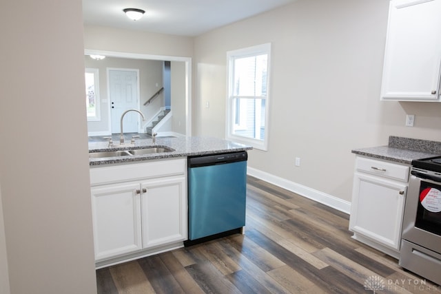 kitchen featuring stone countertops, sink, stainless steel appliances, and dark hardwood / wood-style flooring