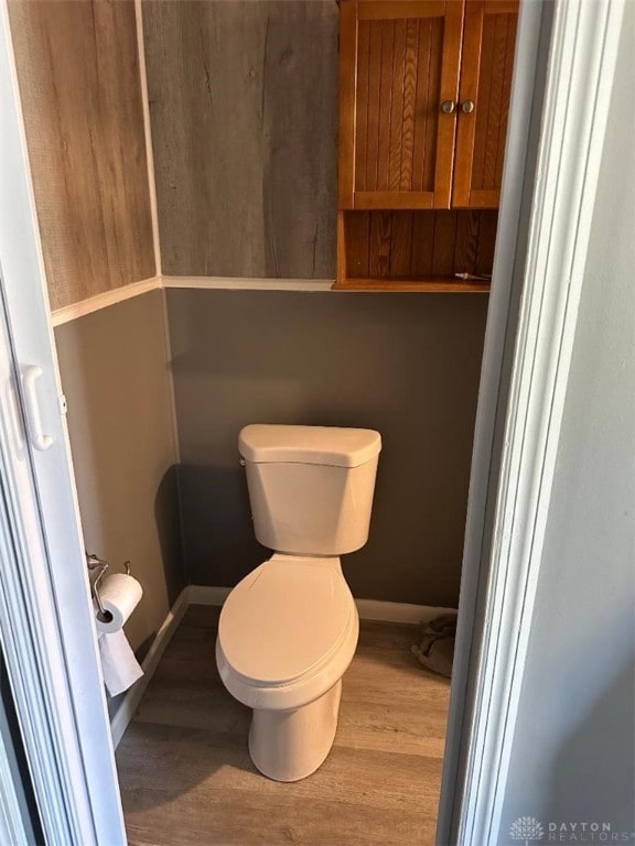 bathroom featuring toilet and hardwood / wood-style floors