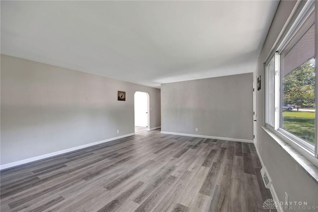 empty room featuring hardwood / wood-style flooring