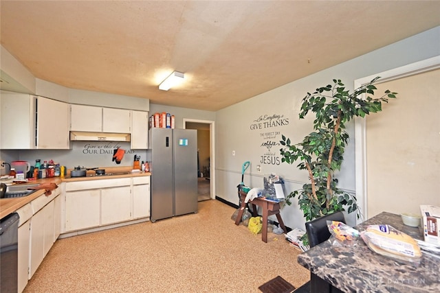 kitchen with refrigerator, dishwasher, white cabinetry, and sink