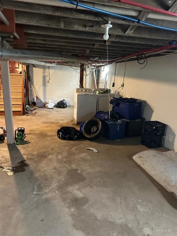 basement featuring separate washer and dryer