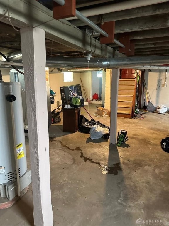 basement featuring gas water heater