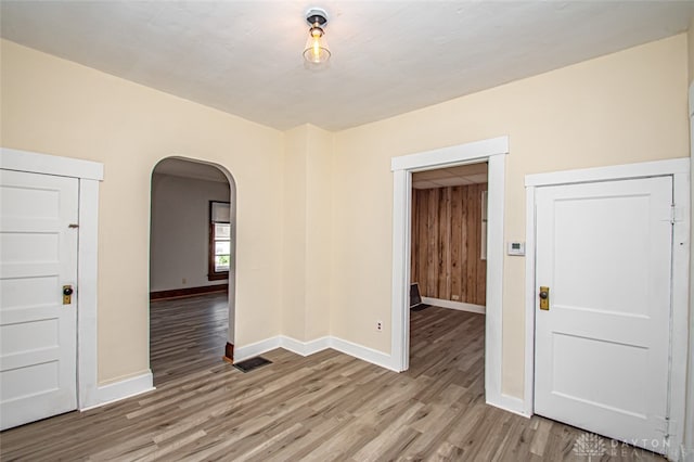 spare room with light wood-type flooring