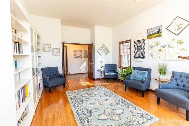 living area with wood-type flooring