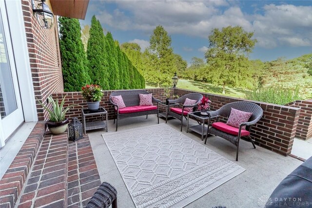 view of patio / terrace with an outdoor hangout area