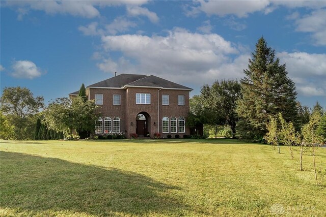 view of front of home with a front yard