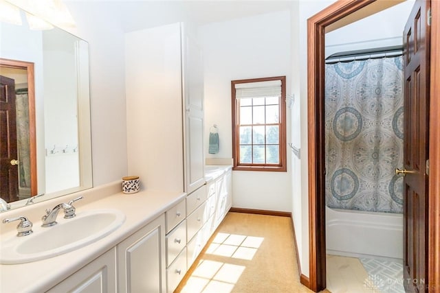 bathroom with vanity and shower / tub combo