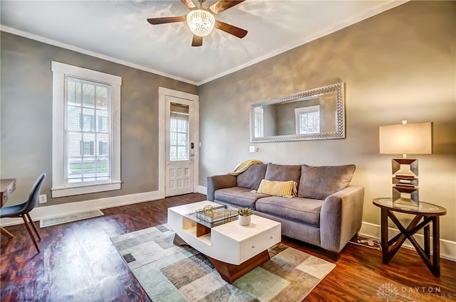 living room featuring ceiling fan, hardwood / wood-style floors, and ornamental molding