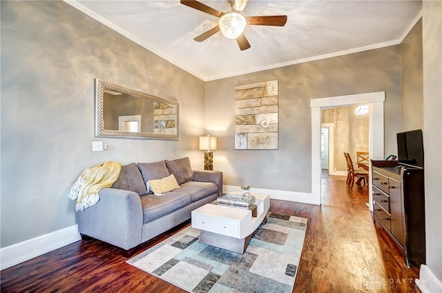 living room featuring ceiling fan, crown molding, and hardwood / wood-style floors