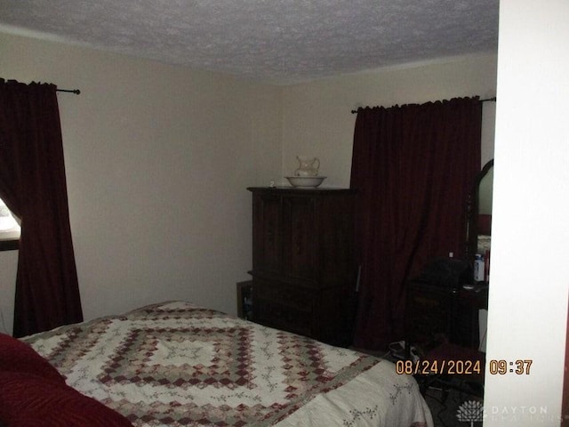 bedroom with a textured ceiling