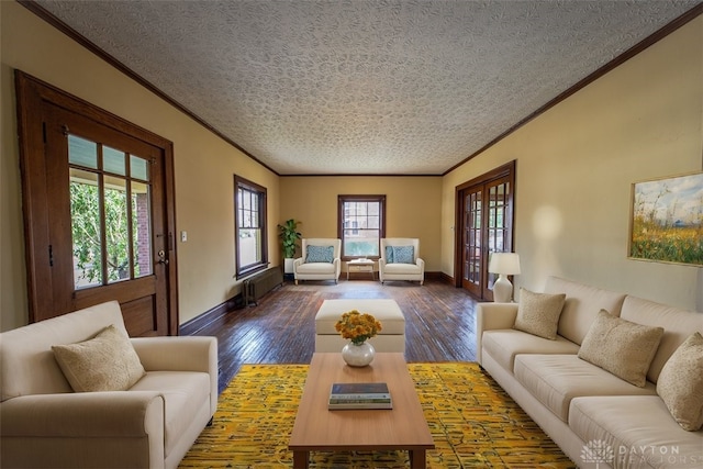 living room with crown molding, a textured ceiling, and dark hardwood / wood-style flooring