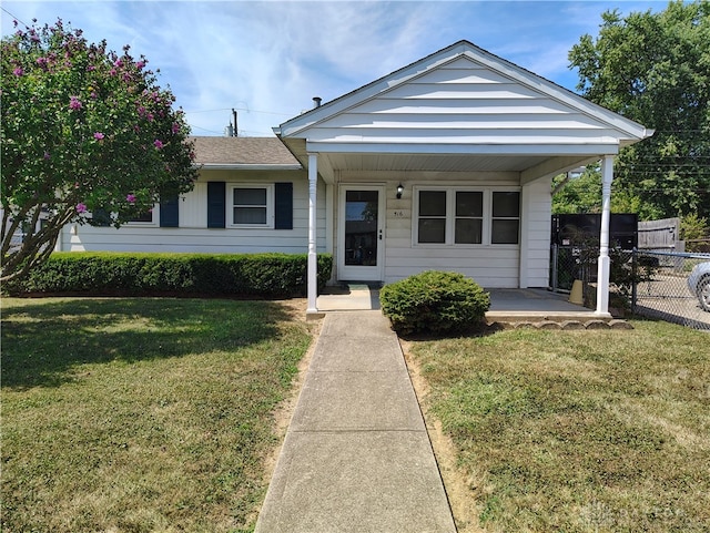 view of front of home with a front yard