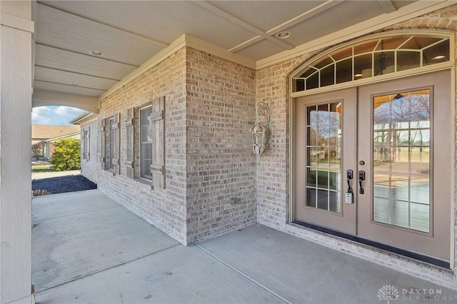 entrance to property featuring french doors