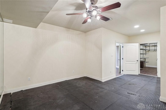 unfurnished room featuring ceiling fan