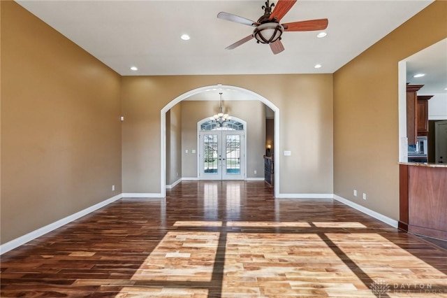 interior space with ceiling fan, french doors, and hardwood / wood-style flooring