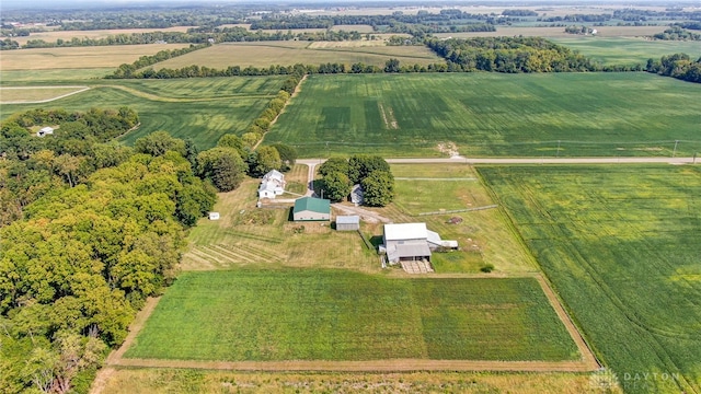 birds eye view of property featuring a rural view