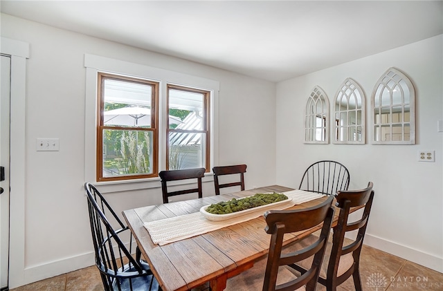 view of tiled dining space