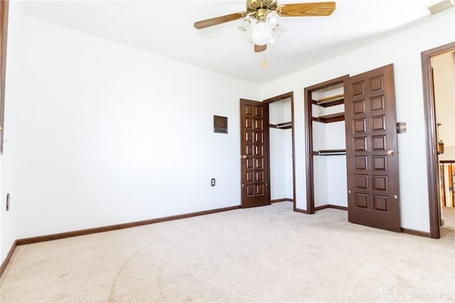 unfurnished bedroom with light carpet and ceiling fan