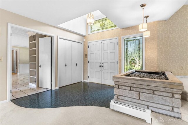 tiled entrance foyer with baseboard heating