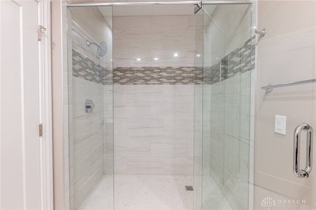 full bathroom featuring a stall shower