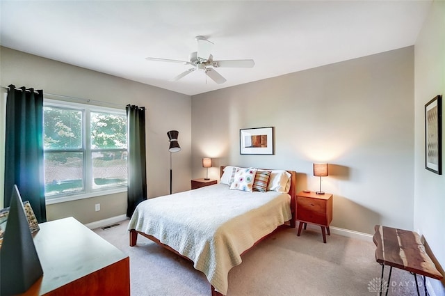 bedroom featuring ceiling fan and carpet floors