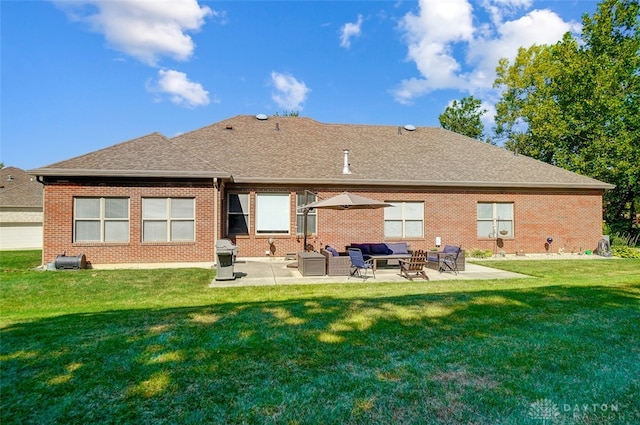 back of house featuring a yard and a patio area