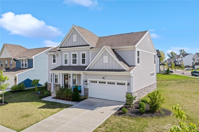 craftsman house featuring a garage and a front yard