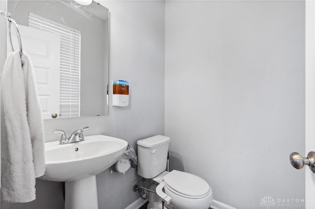 bathroom featuring toilet