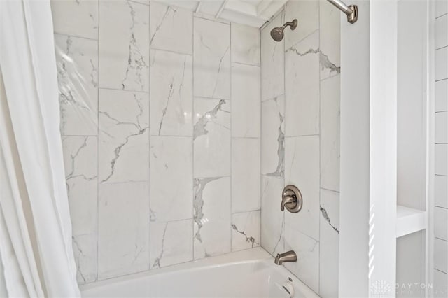 bathroom featuring shower / tub combo with curtain