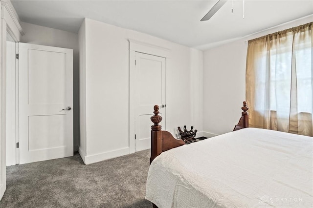 carpeted bedroom with ceiling fan