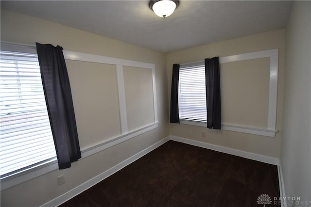 spare room with plenty of natural light