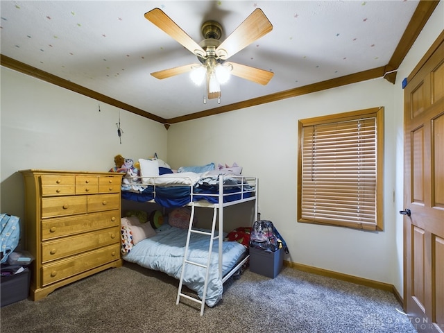 carpeted bedroom featuring ornamental molding and ceiling fan