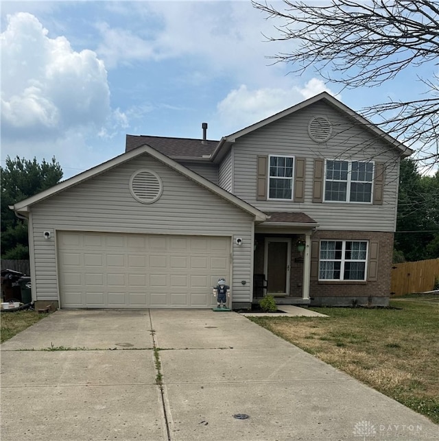 front facade with a garage and a front lawn