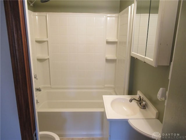 full bathroom with vanity, shower / bathtub combination, and toilet