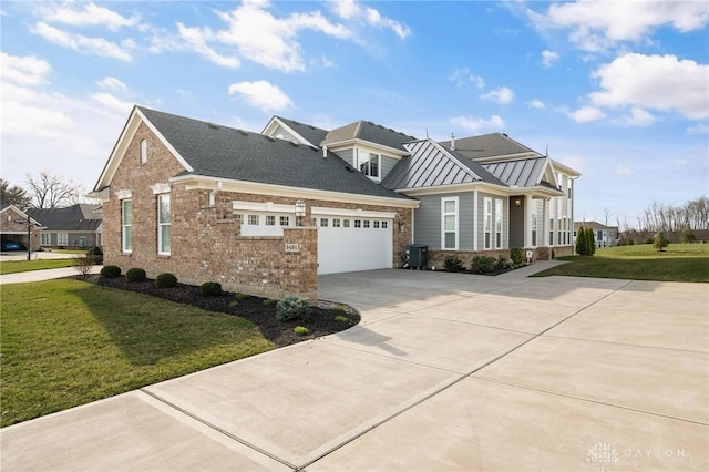 view of front of house featuring a front yard and a garage