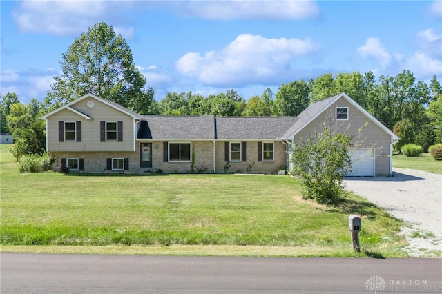 view of front facade featuring a front lawn and a garage