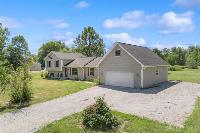 view of front facade featuring central AC, a garage, and a front lawn