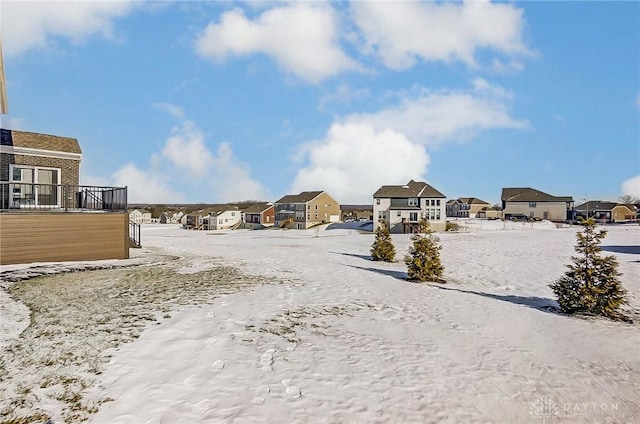 view of yard covered in snow