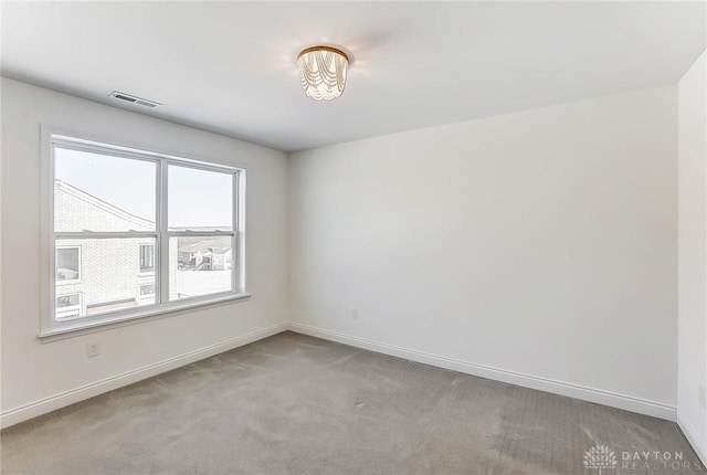 unfurnished room with carpet