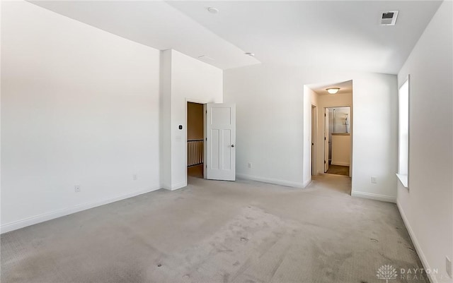 unfurnished bedroom with light carpet