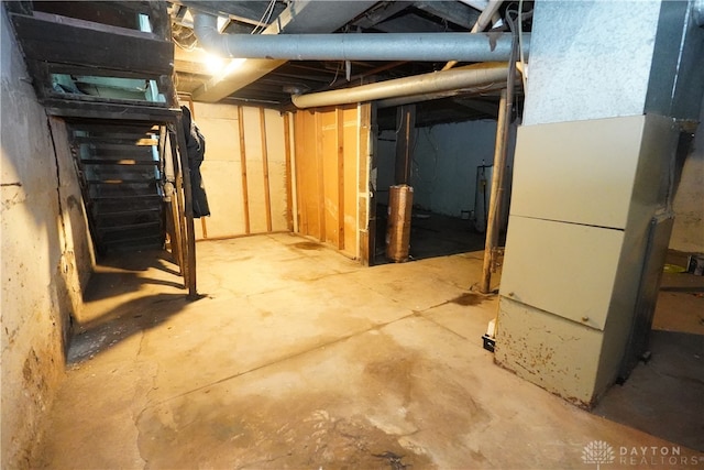 basement featuring heating unit