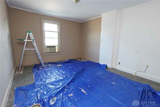 carpeted bedroom with ornamental molding and cooling unit