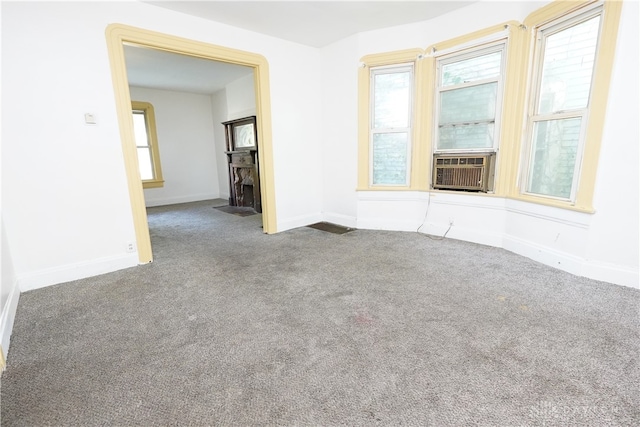 carpeted empty room featuring cooling unit