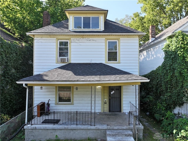 view of front property featuring covered porch