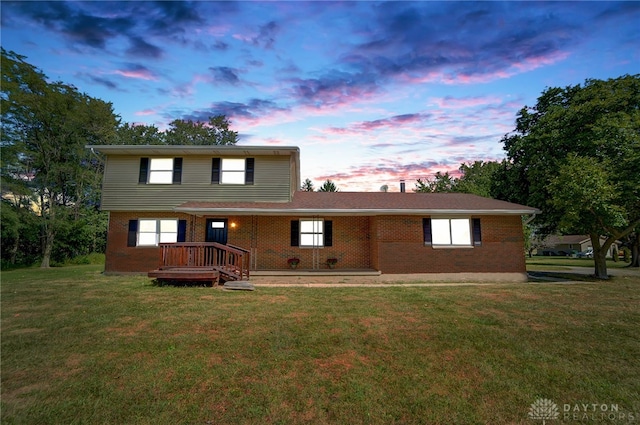 view of front of house with a lawn