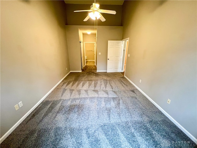 unfurnished bedroom with carpet floors and ceiling fan