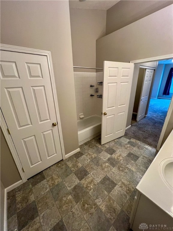 bathroom with vanity and walk in shower