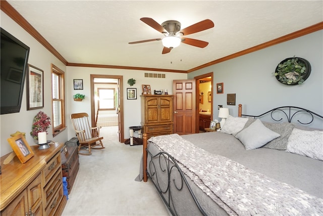 bedroom with ornamental molding, ceiling fan, and light colored carpet