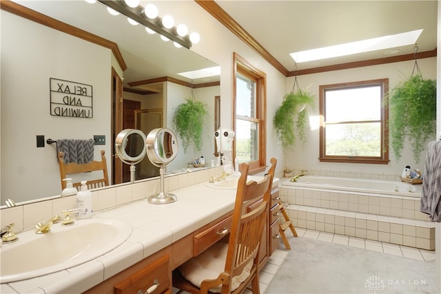 bathroom featuring vanity, tiled bath, tile patterned flooring, crown molding, and a skylight